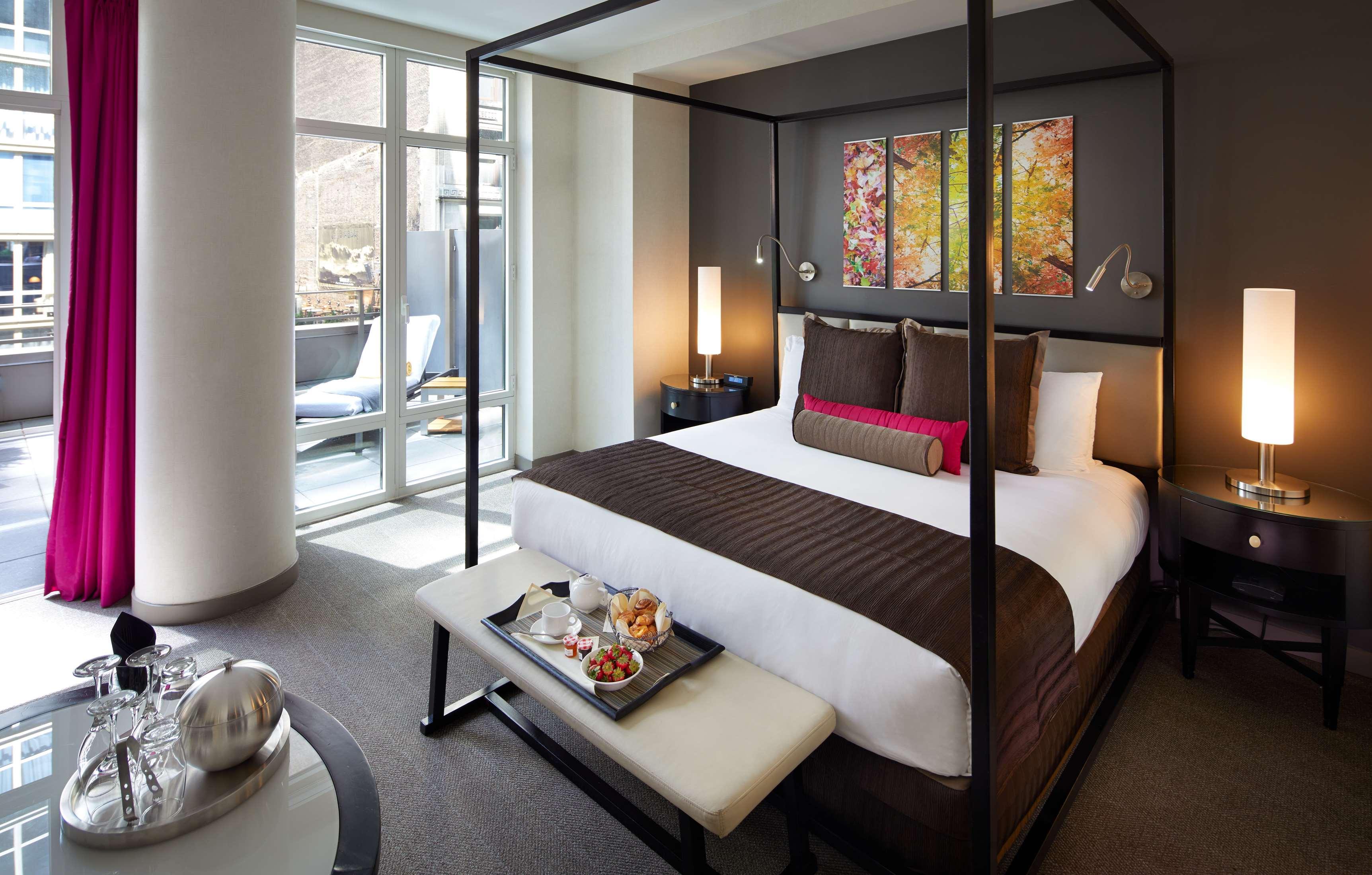 Royalton Park Avenue Hotel New York Kültér fotó A bedroom at the Mandarin Oriental Washington DC